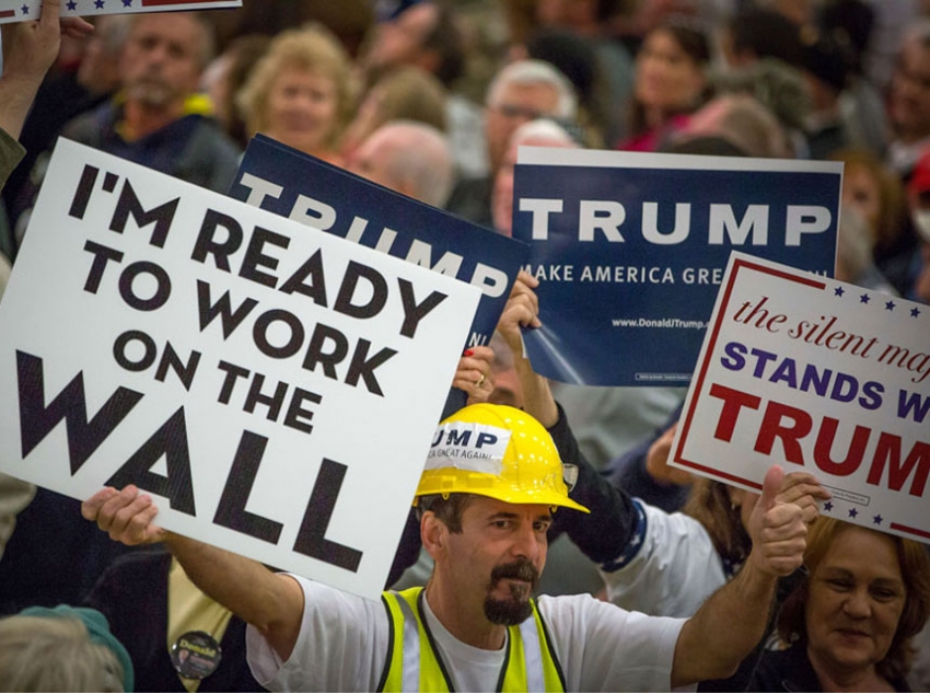 A Trump supporter at a rally in Myrtle Beach, S.C., signals his feelings about Mexican immigration. (ARON P. BERNSTEIN/ GETTY IMAGES)