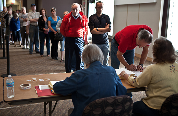 Voters line up at the Kenosha Public Museum to cast their votes in Wisconsin's recall election. (Zbigniew Bzdak, Chicago Tribune)